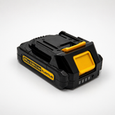 Black and yellow battery pack with 'kuemue' branding on a white background