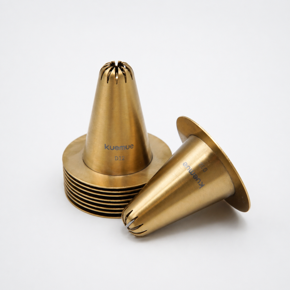 Set of gold metal baking tips on a white background