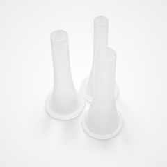 three white plastic funnels on a light gray background